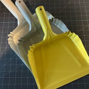 Set of Yellow, Gray, & White Metal Dustpans